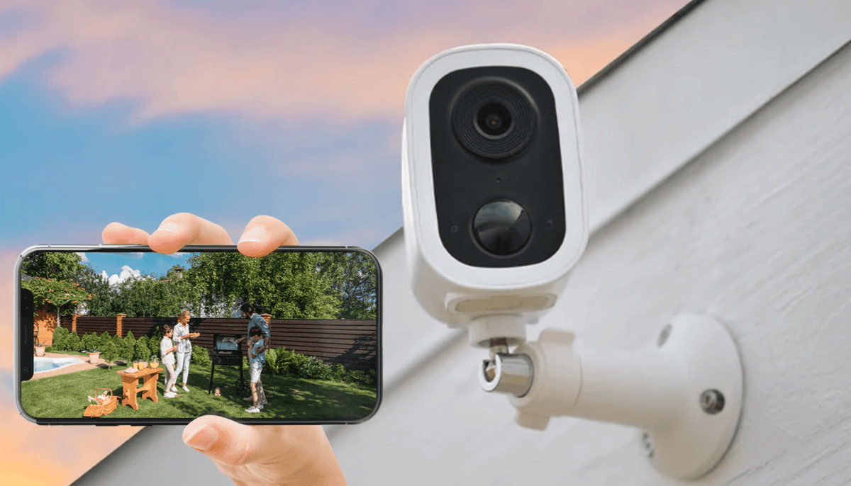 Toucan S4 camera mounted outside a house with a live view on a phone