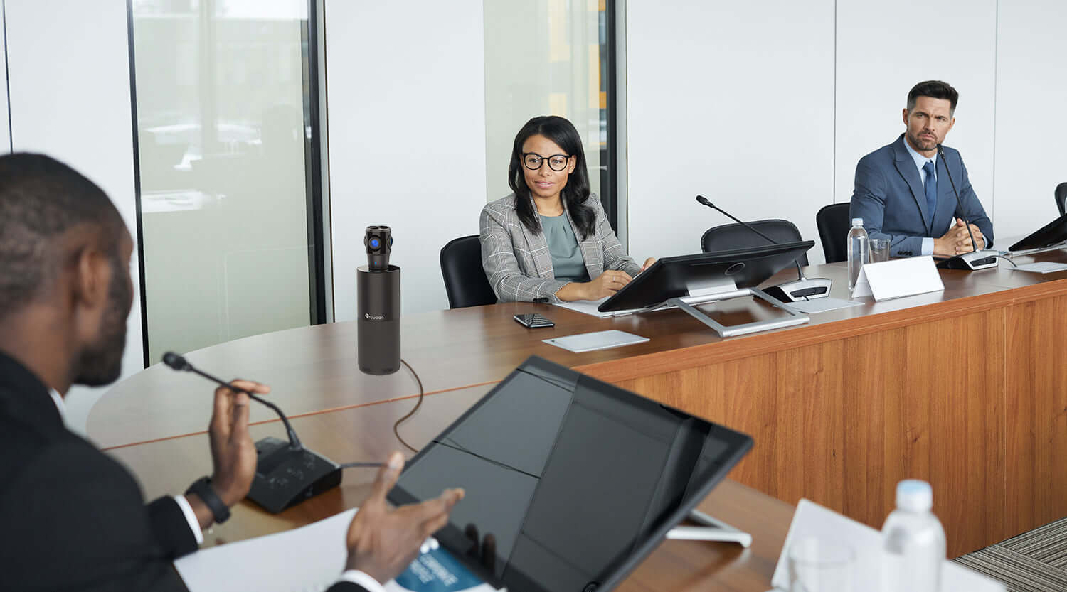 8 Uses of the 360 Conference Camera in Government Offices | Toucan Video Conference System 360 on table in a government office conference room with 3 people