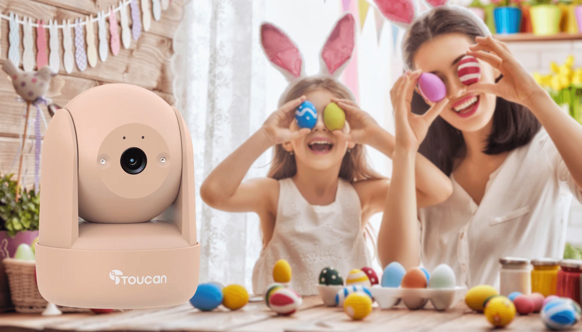 Baby's First Easter - Keep Your Home Safe for Little Explorers | Toucan Seek Indoor Pan & Tilt Security Camera on photo of mom and daughter making Easter eggs