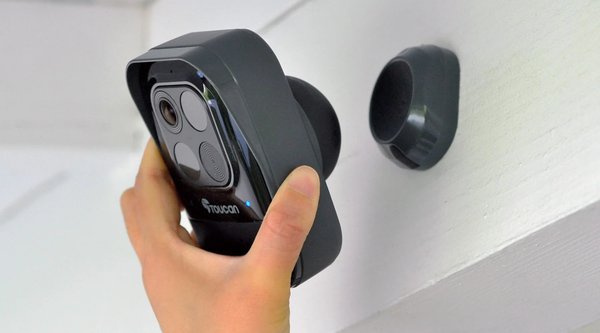 person installing the Toucan Wireless Security Camera PRO