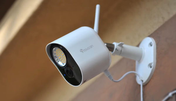 close up shot of Toucan Solutions floodlight camera installed outside the house at daytime