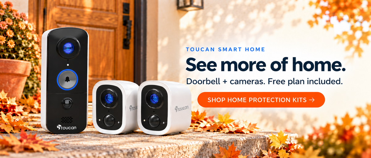 Toucan Essential Home Protection Kit with one V3D video doorbell and two S4 wireless security cameras on an autumn porch.