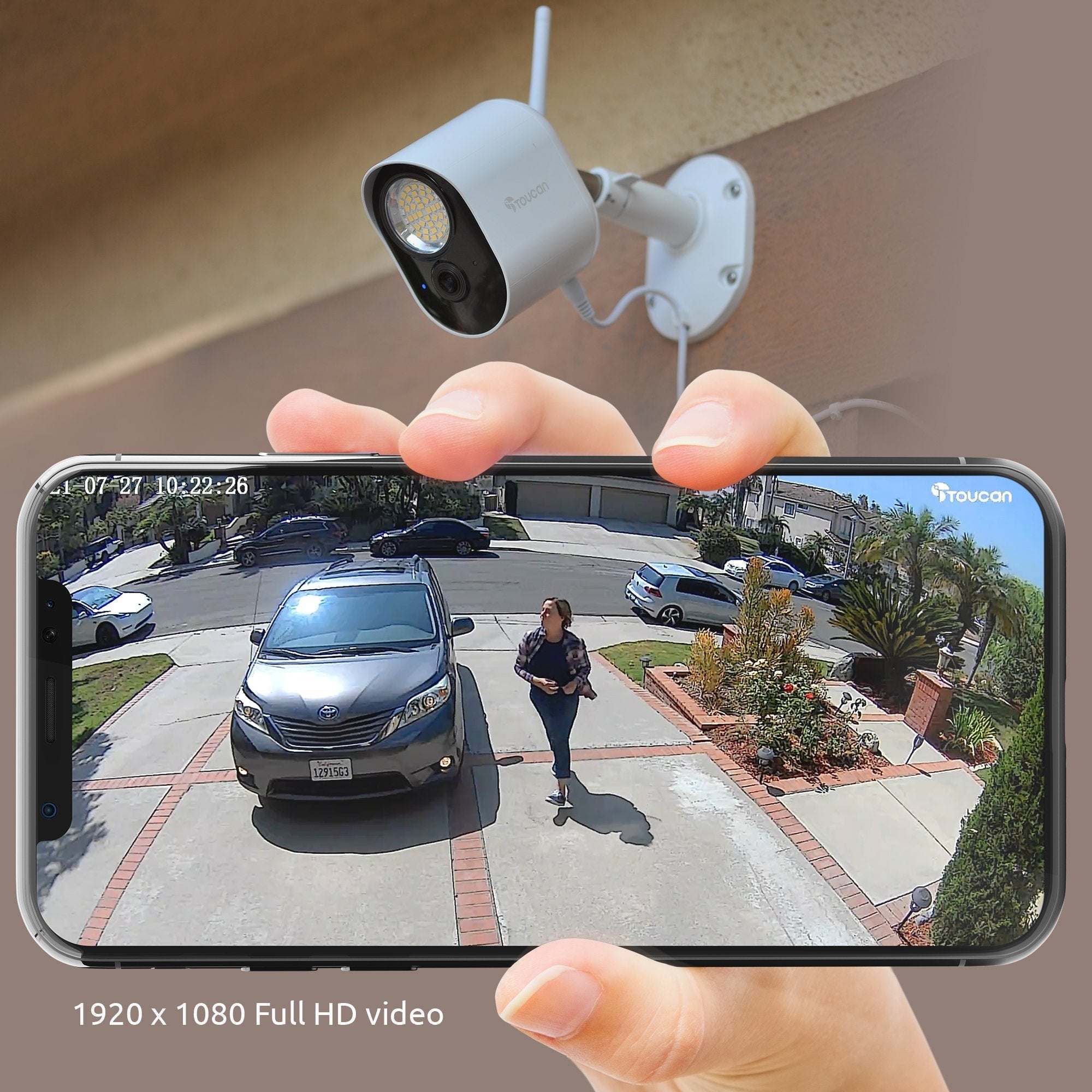 Security Floodlight Camera monitoring driveway with 1080P Full HD video and motion detection